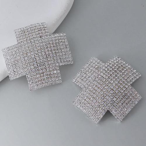Self-adhesive cross-shaped nipple covers with rhinestones